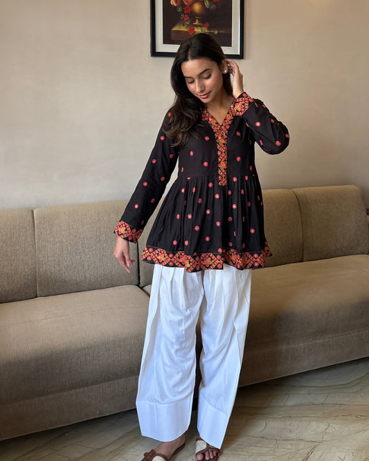 Festive Noir Peplum Set – Black Printed Kurta with White Farshi Salwar