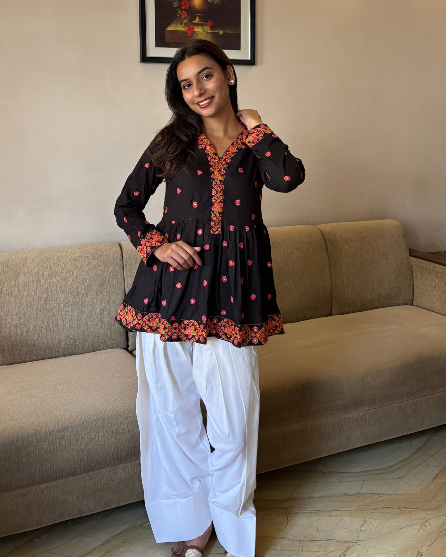 Festive Noir Peplum Set – Black Printed Kurta with White Farshi Salwar