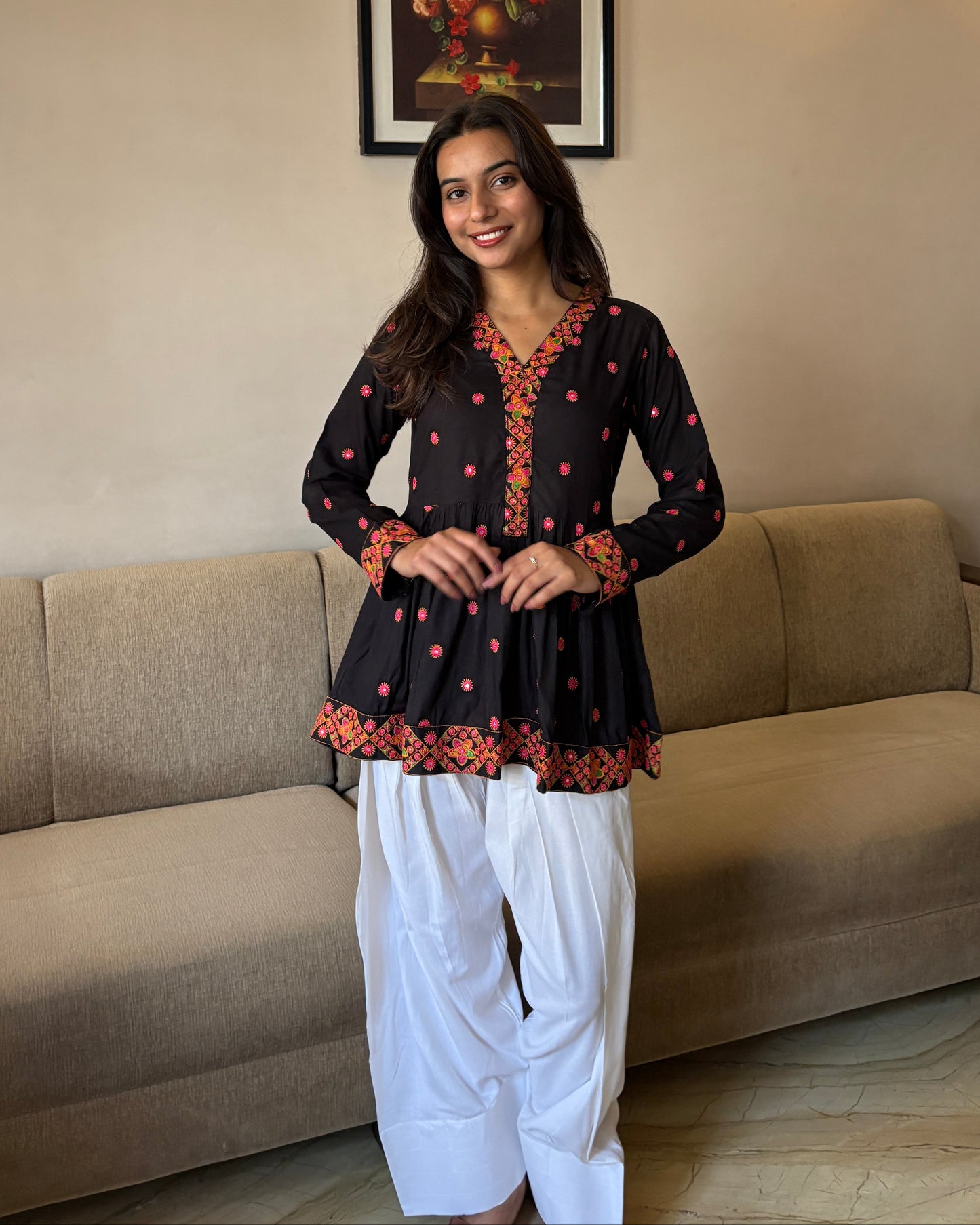 Festive Noir Peplum Set – Black Printed Kurta with White Farshi Salwar