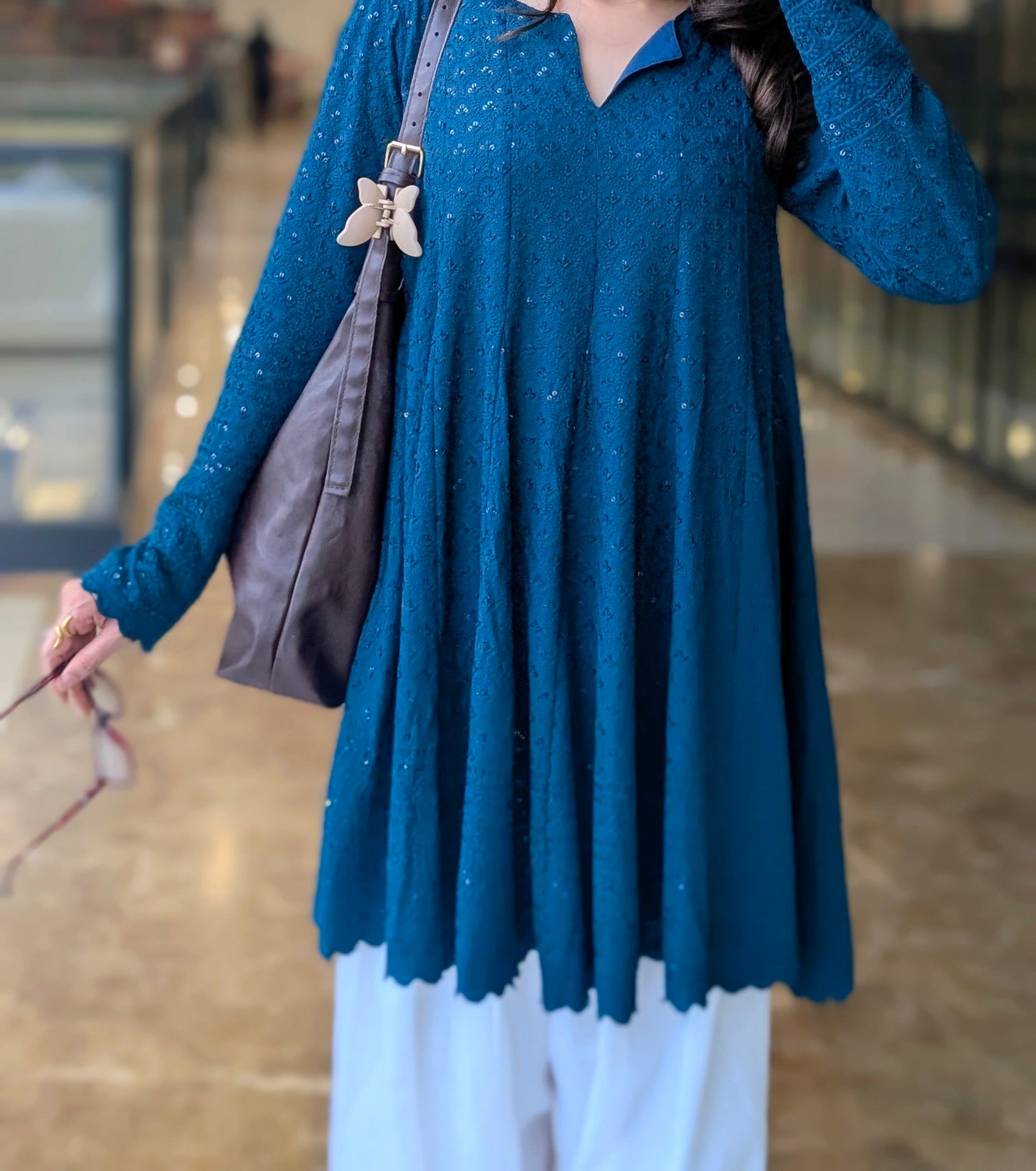 Teal Schiffli embroidered peplum kurta with white farshi salwar