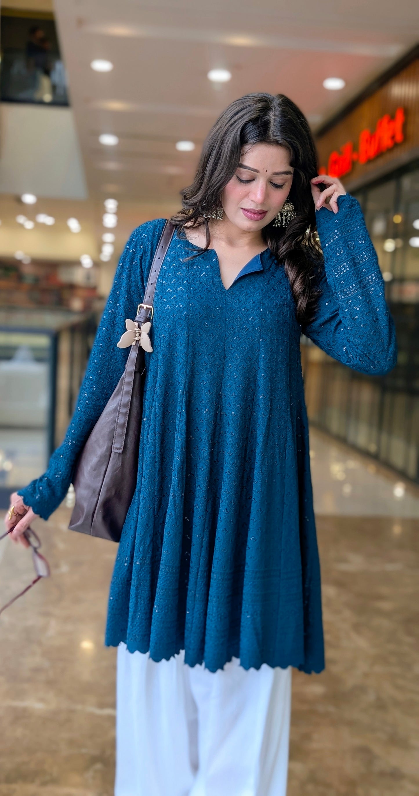 Teal Schiffli embroidered peplum kurta with white farshi salwar 