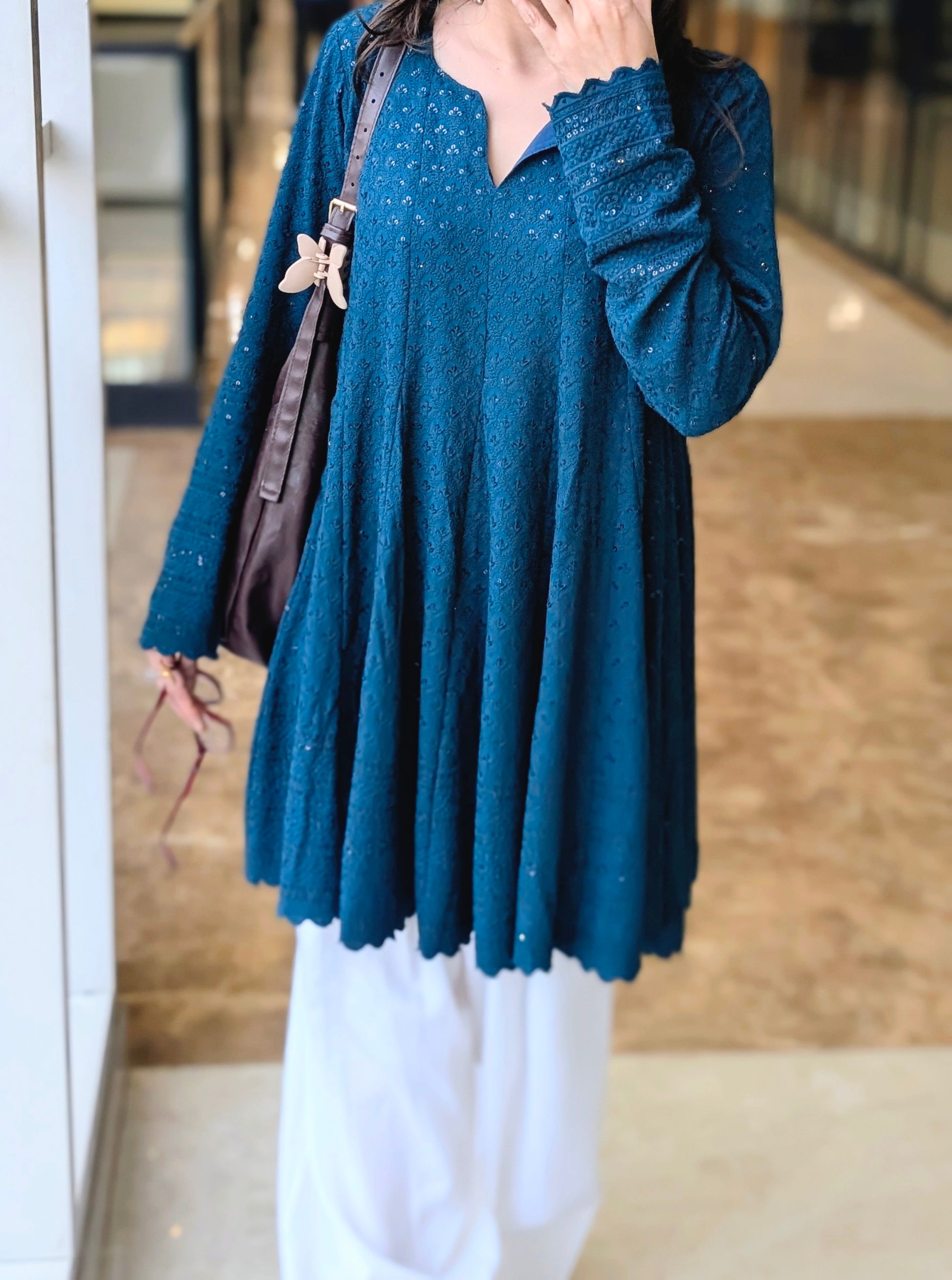 Teal Schiffli embroidered peplum kurta with white farshi salwar - close-up embroidery detail