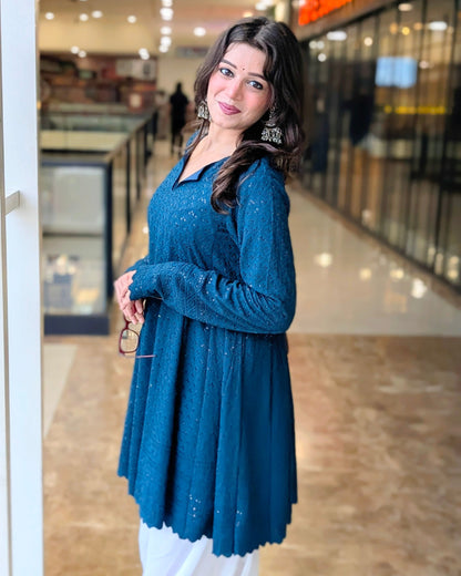Teal Schiffli embroidered peplum kurta with white farshi salwar - front view