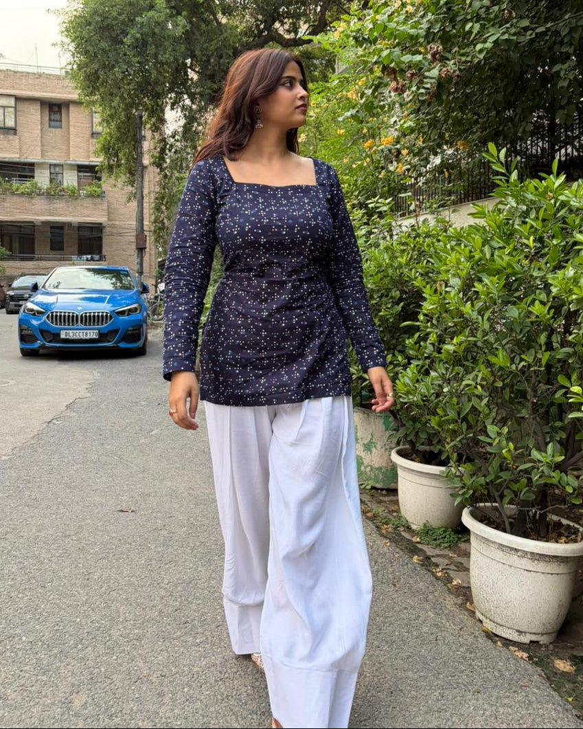 beautiful deep indigo base decorated with an all-over dainty geometric 